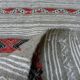 Geometric woven rug with fringes – Ethnic style – Hallway & interior