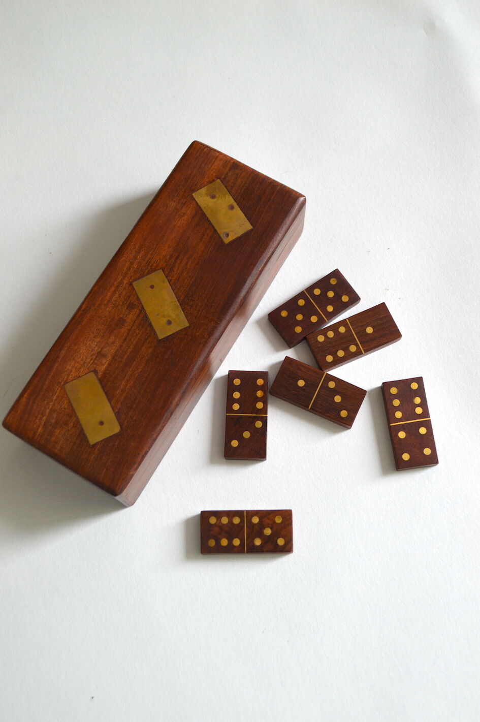 Box of brass and rosewood dominoes