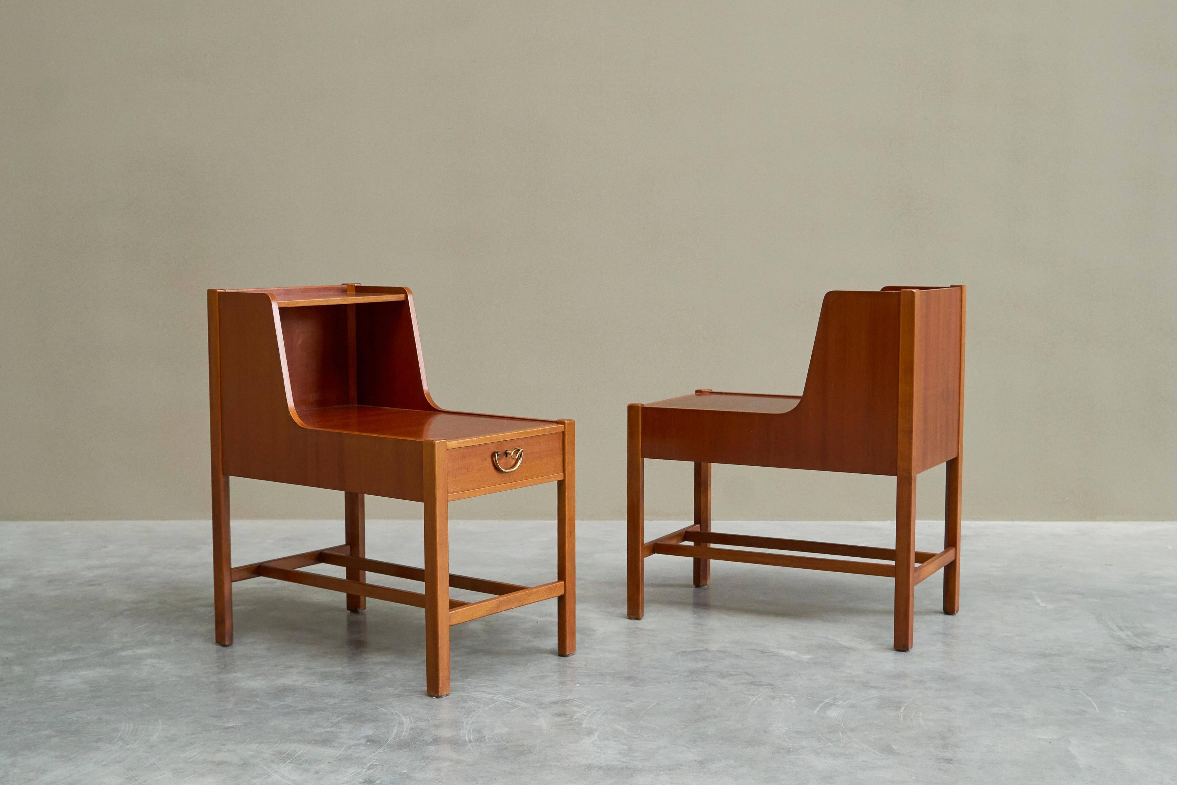 Pair of bedside tables by Nordiska Kompaniet in teak, 1952, by David Rosén.