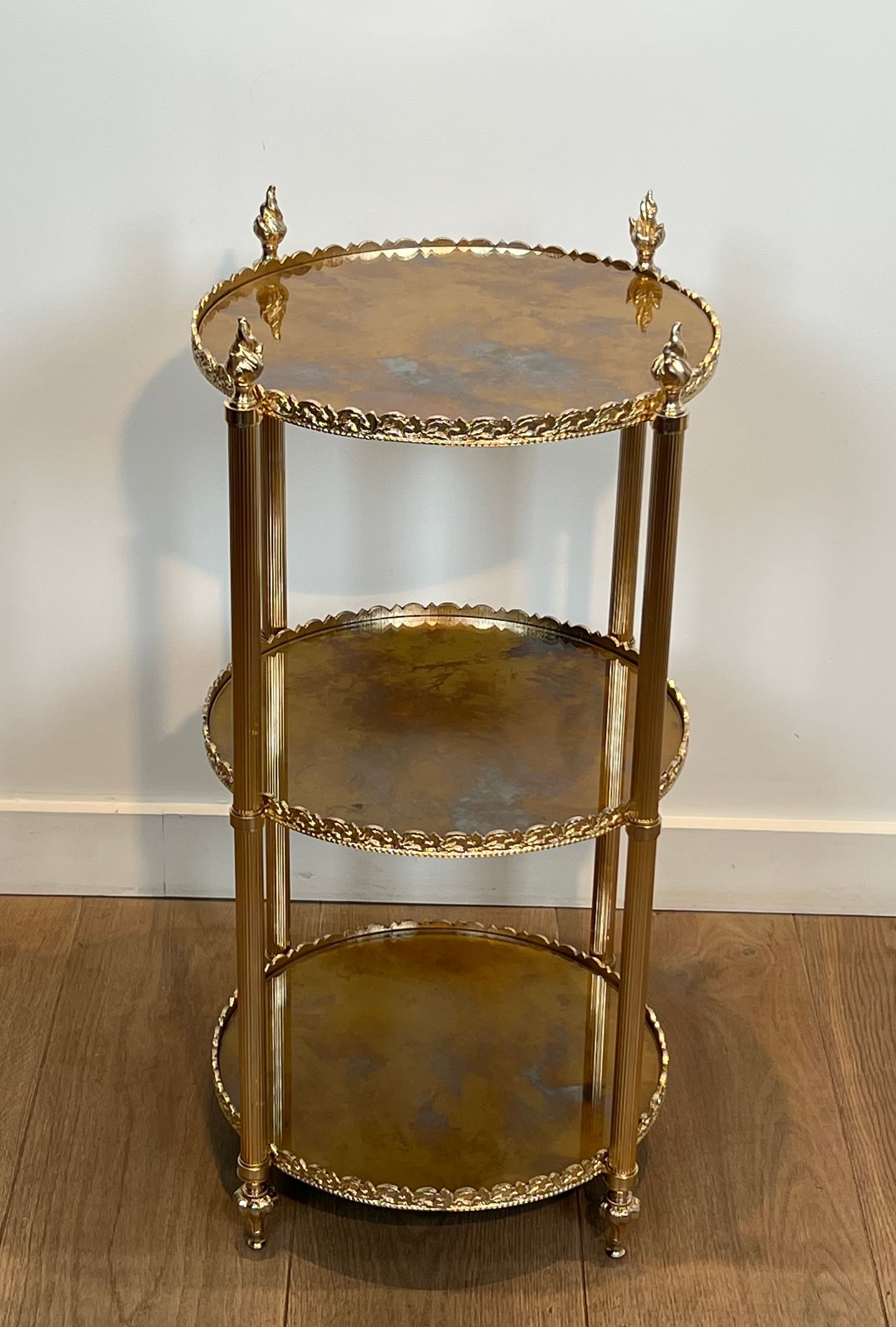 Round silver-plated brass table with triple eglomisé mirror tops from Maison Jansen.