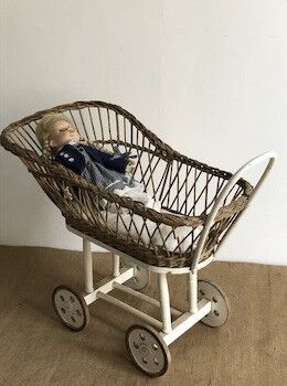 Antique toy, wicker doll cradle