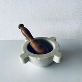 Old marble mortar with wooden pestle