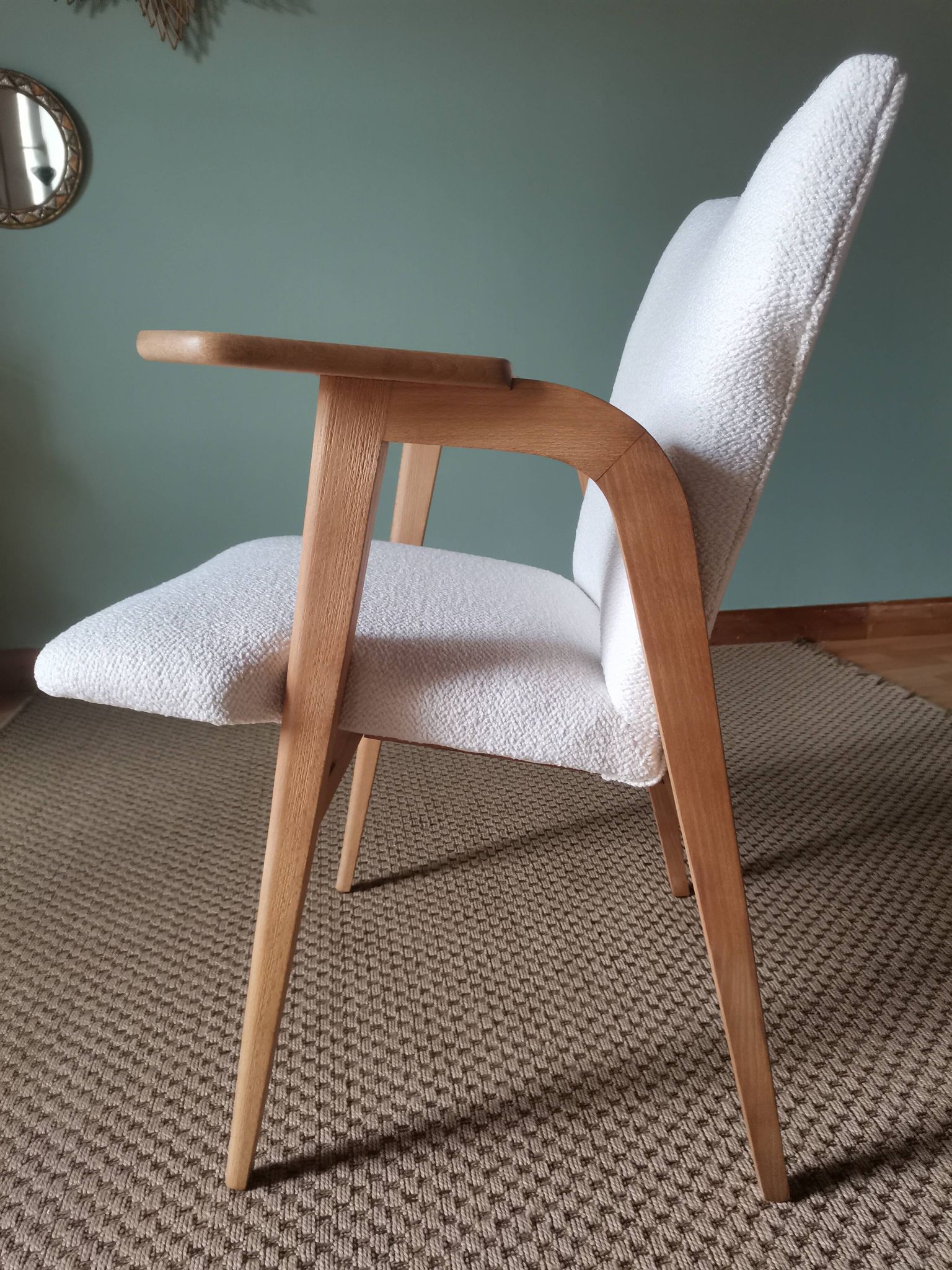 Scandinavian armchairs by Roger Landault in white.