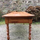 Old cherry farmhouse table with 3 drawers and turned legs