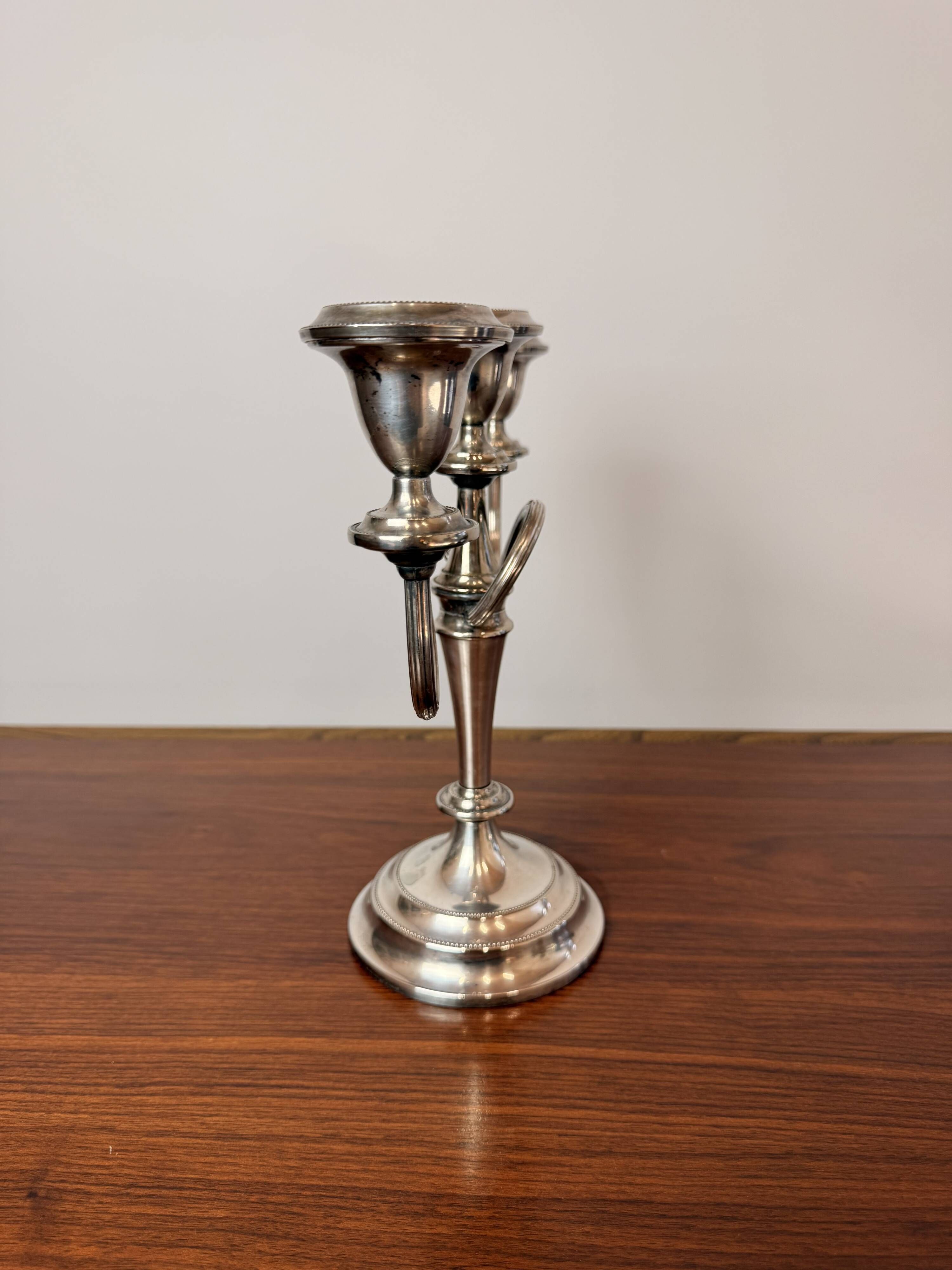 Vintage twisted chandelier with three lights in silver-plated metal.