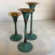 Set of candlesticks with green patina and brass Memphis