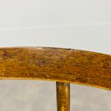 Baumann armchair with Scandinavian style bars, desk