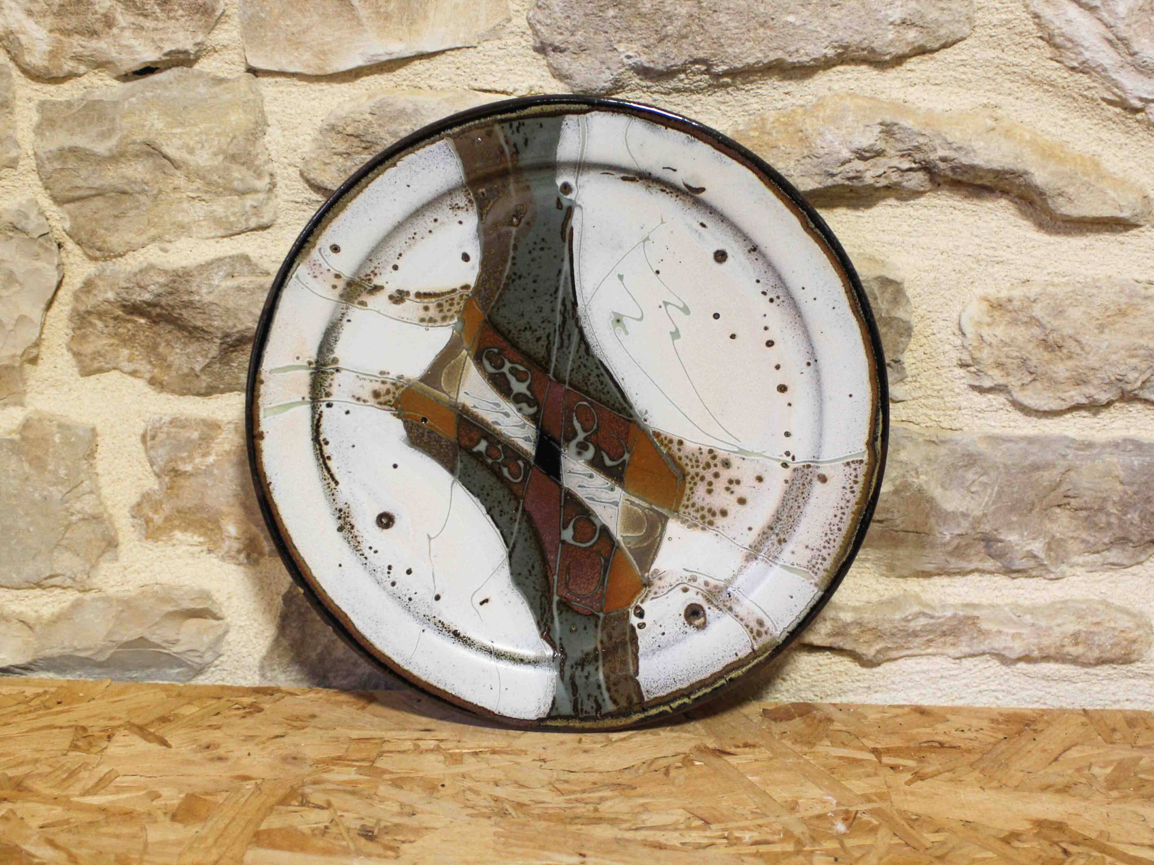 Decorative glazed stoneware plate by Patrick Rollet