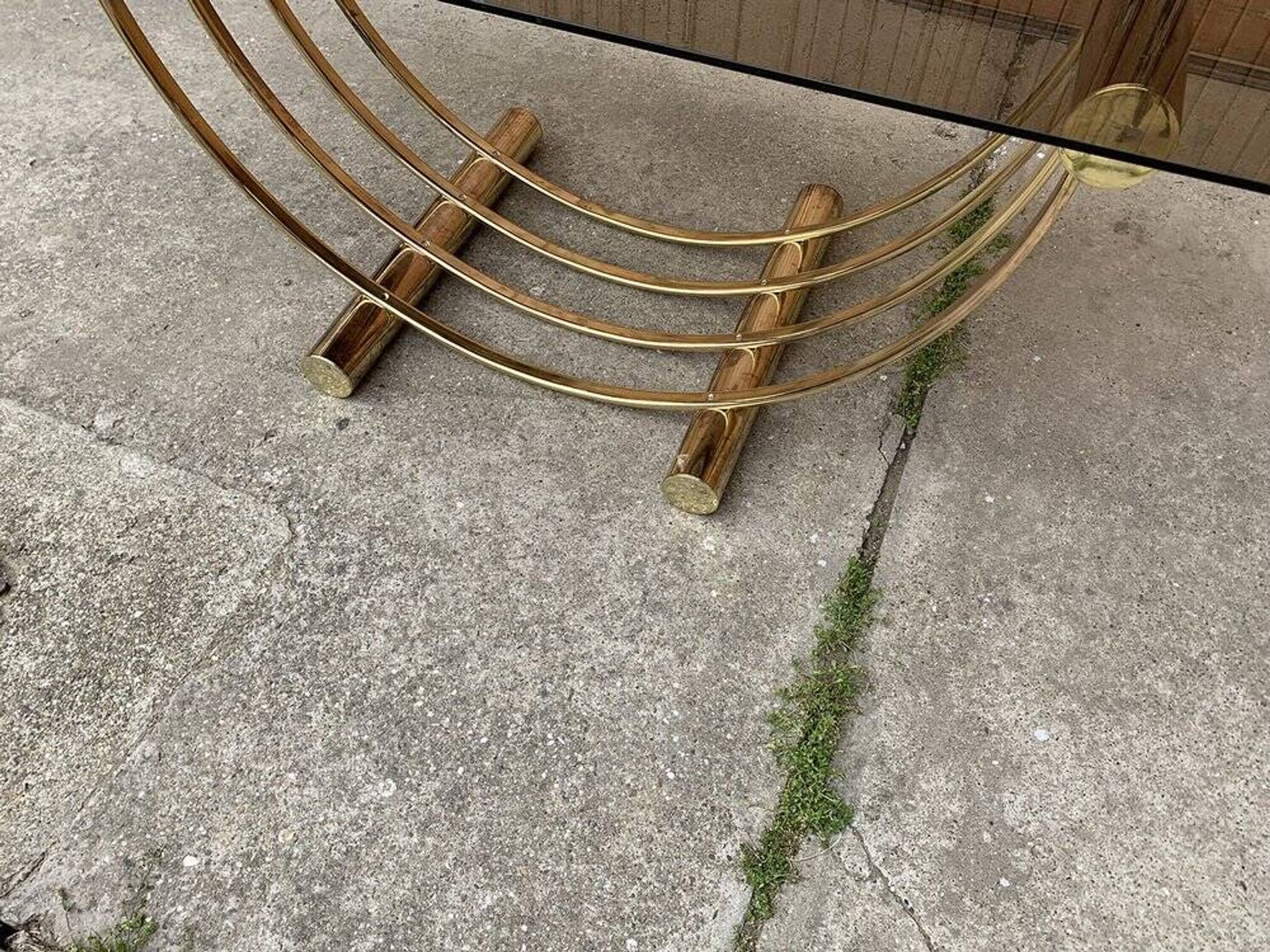 Dining table in brass and straw yellow glass, Regency style, 1970s.