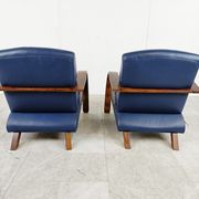 Paire de fauteuils en bois courbé et cuir bleu, années 1970