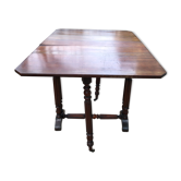 Side table with flaps