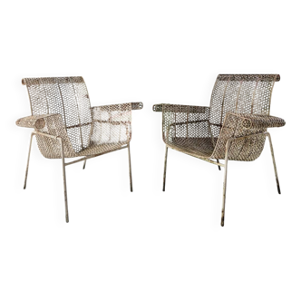 Pair of armchairs by René Malaval