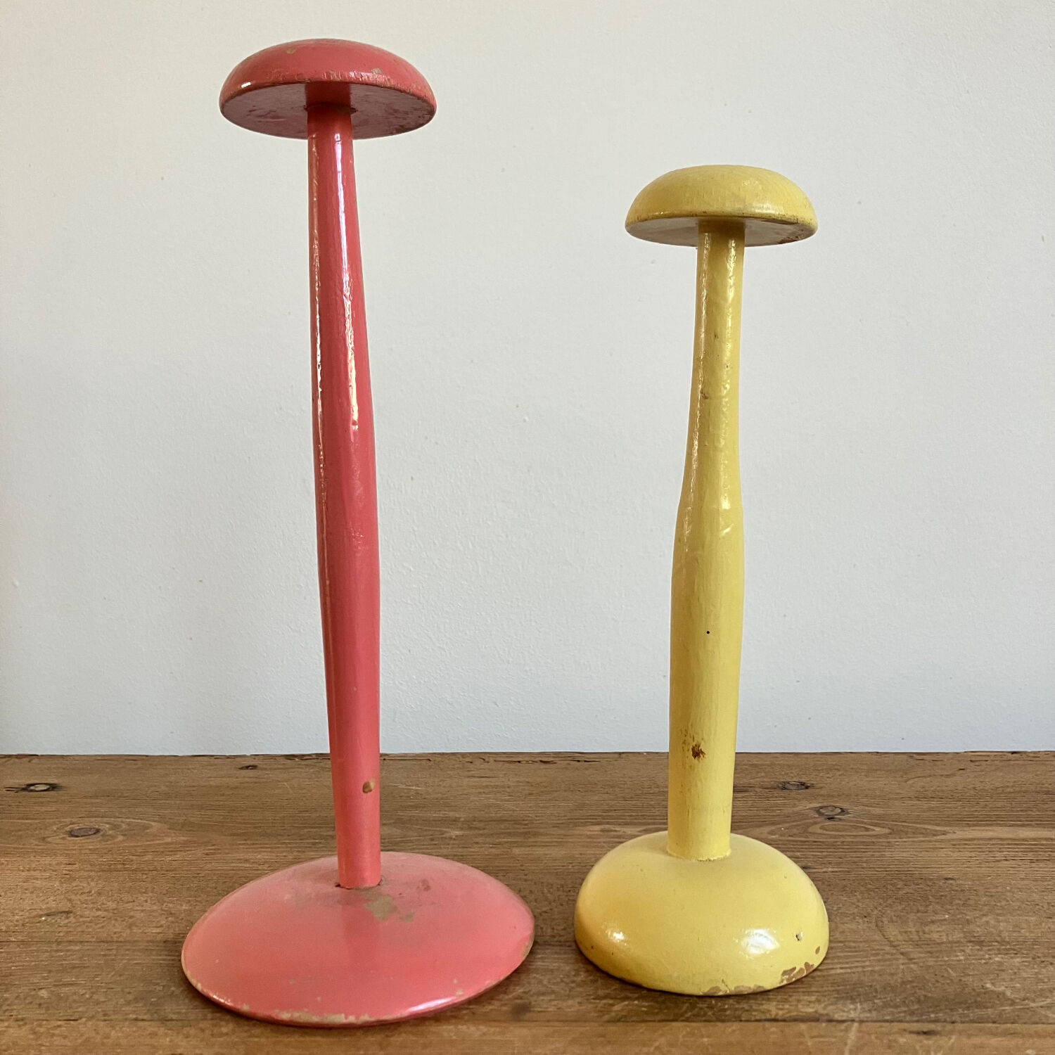 Pair of painted wooden hat displays