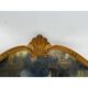 Antique mirror, 20th century, Louis XV style, gilded.