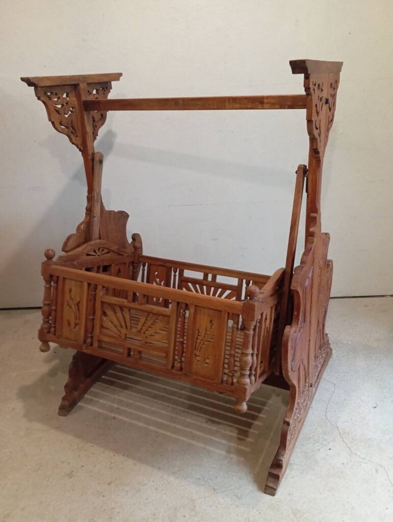 Solid teak carved swing cradle