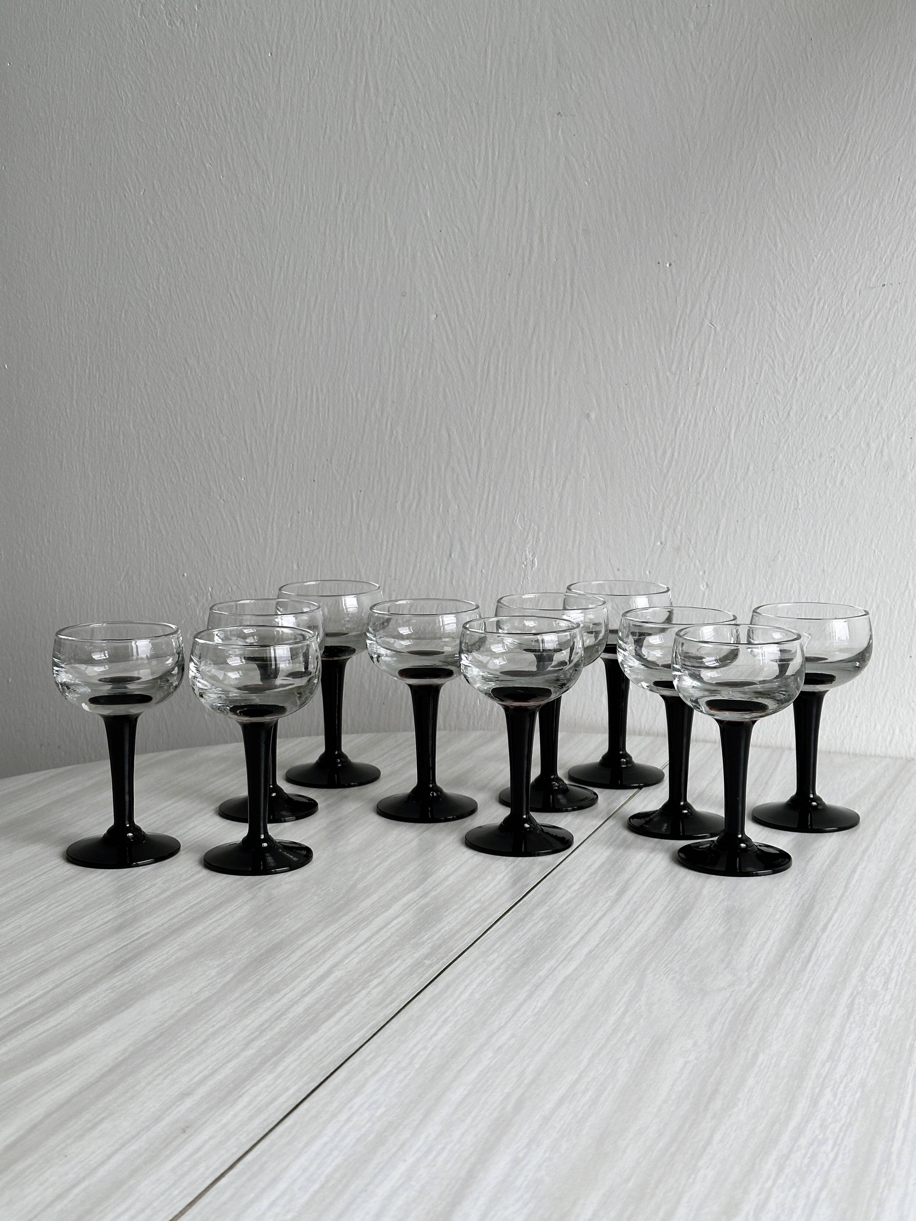 10 black stemmed liqueur glasses
