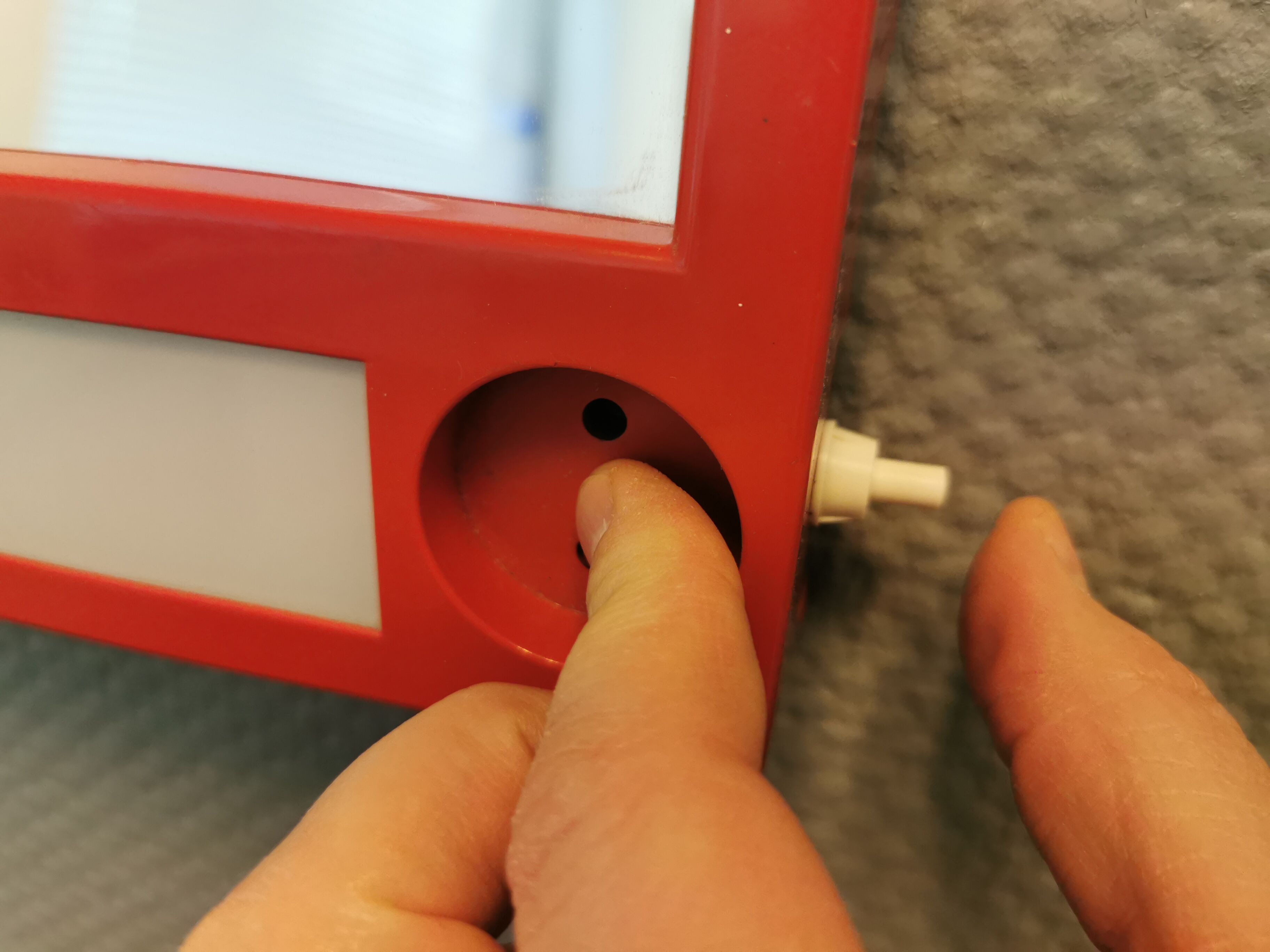 Red danish make up mirror with light and power plug from the 1970
