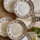 Set of 8 old flat plates in iron earth, decorations of HBC swallows