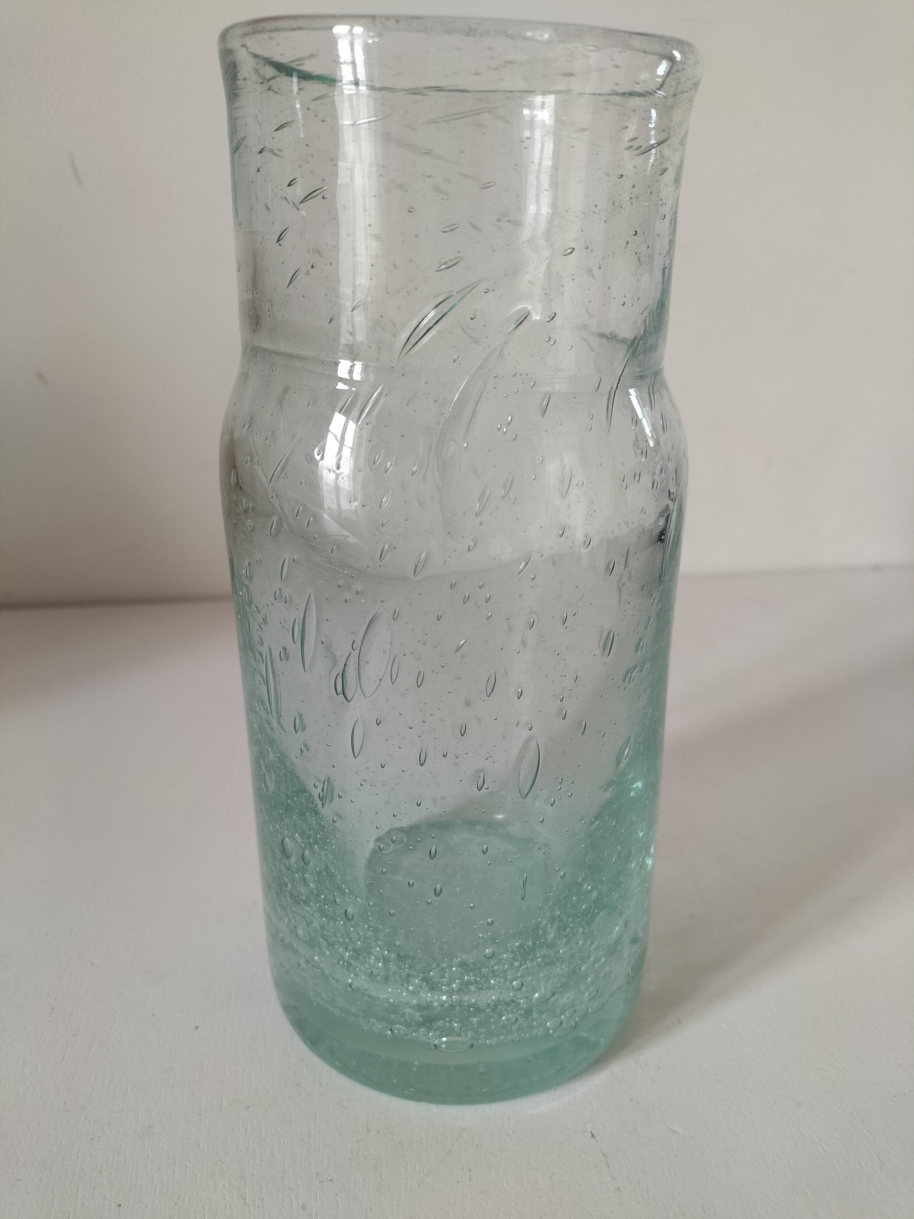 Vintage vase in very pale green bubbled glass, handcrafted