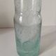 Vintage vase in very pale green bubbled glass, handcrafted