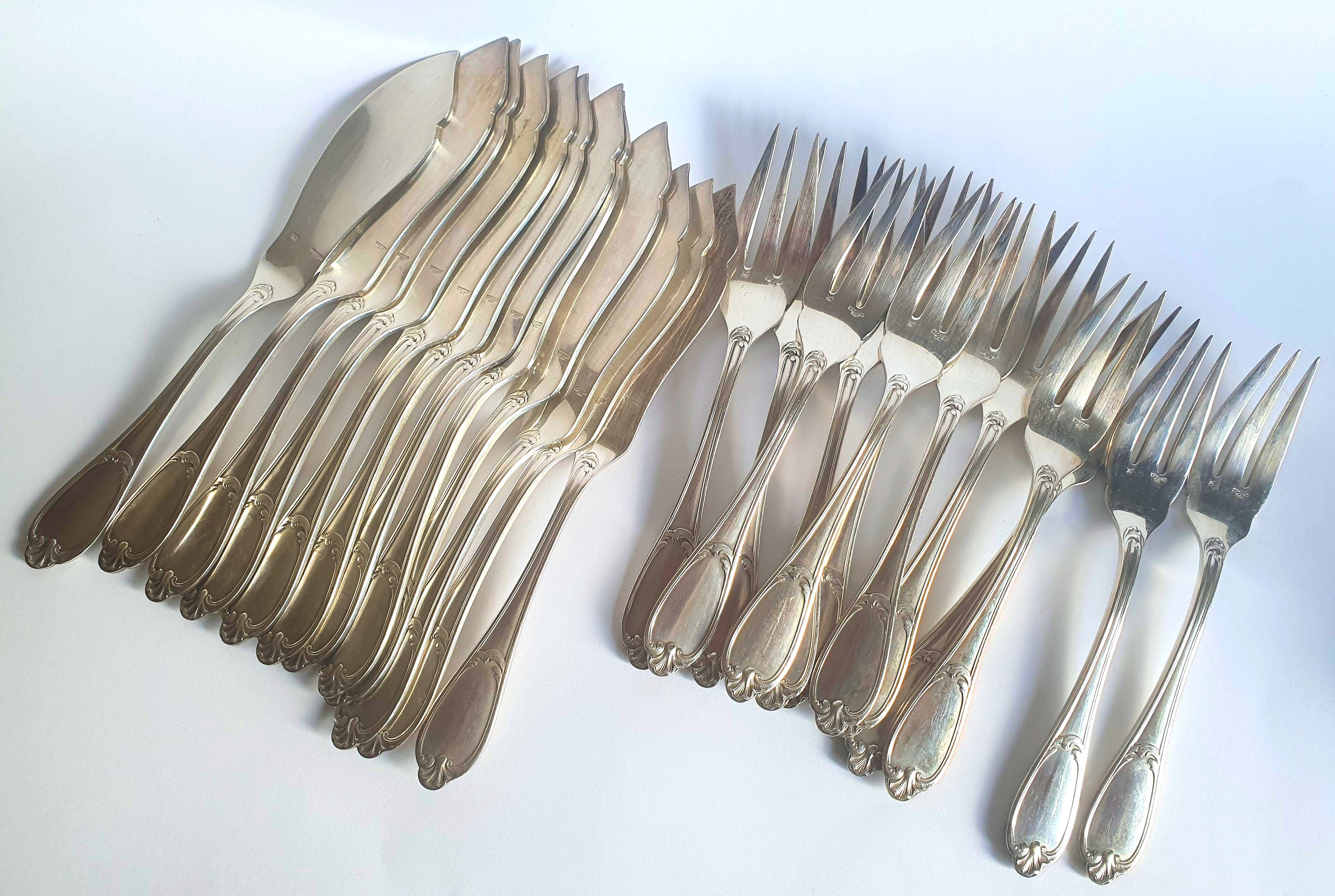 Fish set in silver metal Ercuis