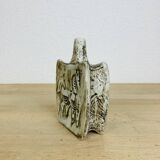 Vintage ceramic vase with horses