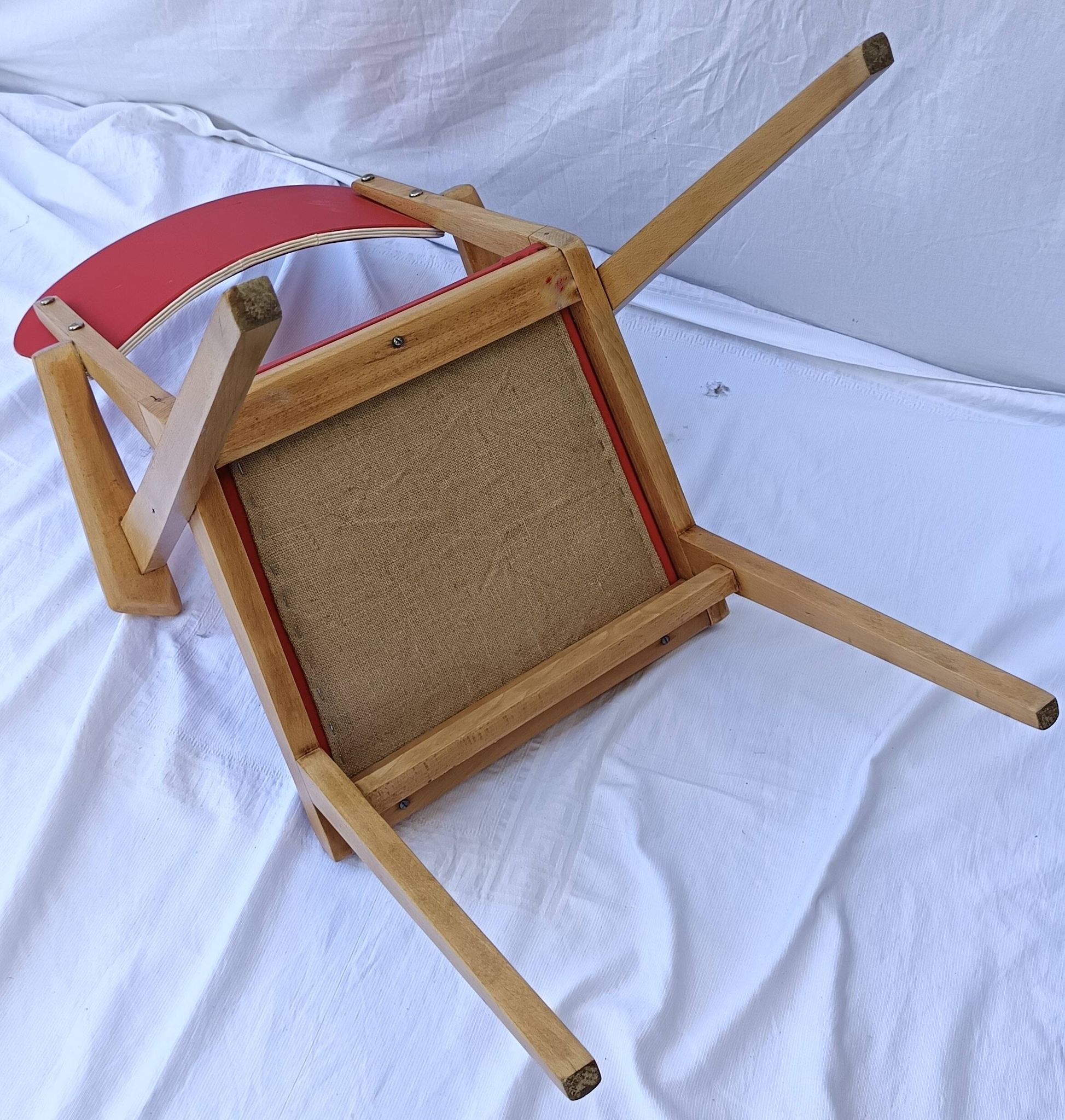 1960s wooden chair with armrests and faux leather seat