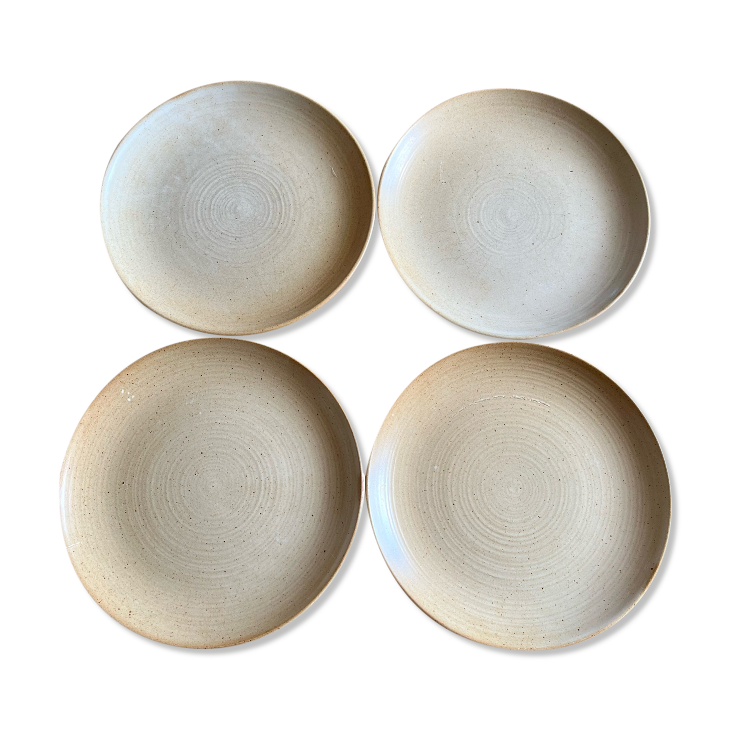 Set of four vintage stoneware plates