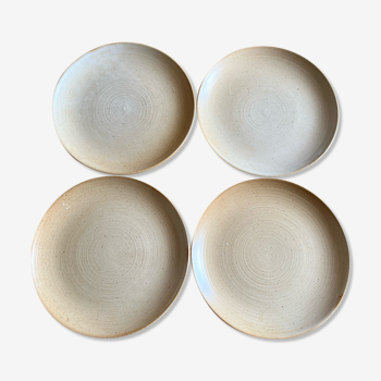 Set of four vintage stoneware plates