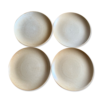 Set of four vintage stoneware plates