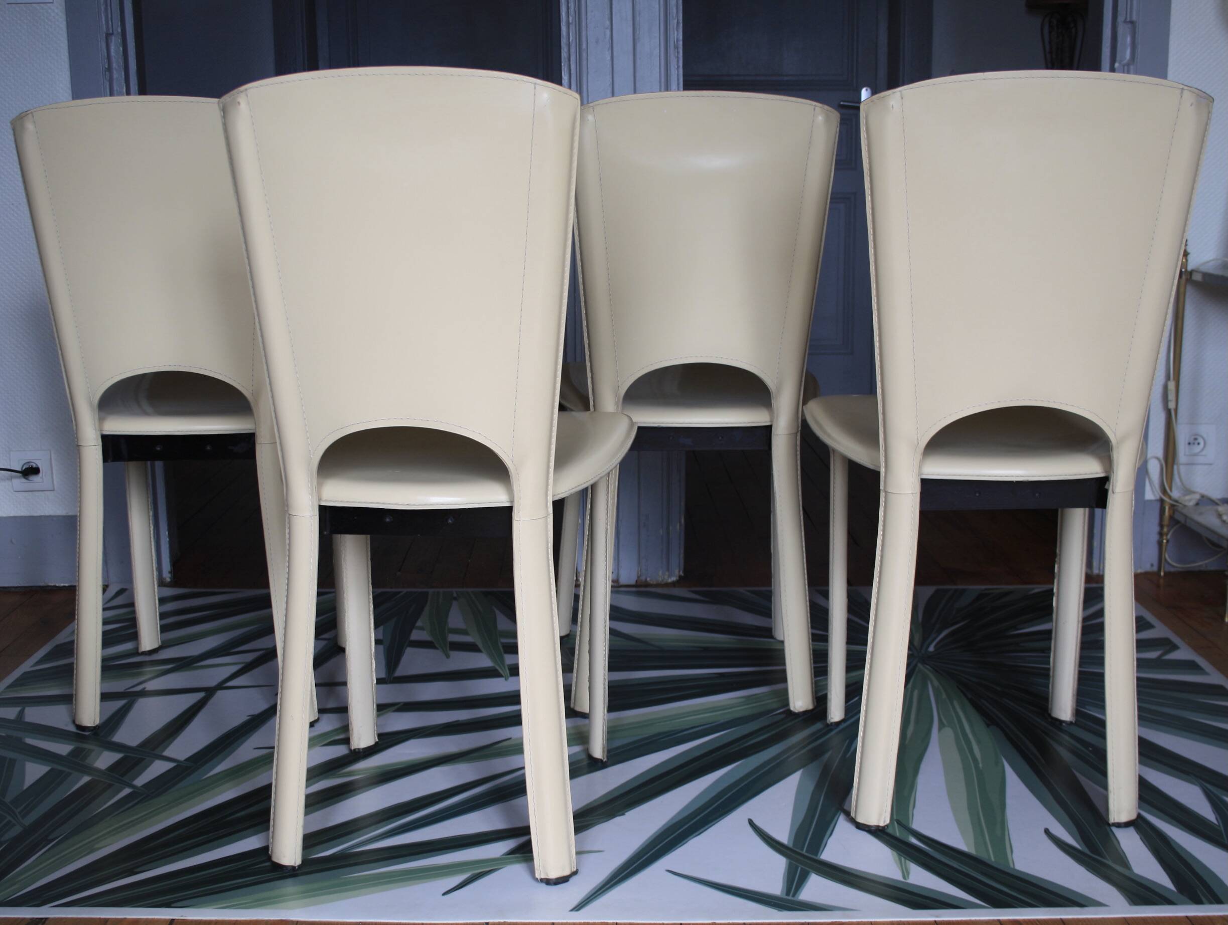 Set of 4 beige leather chairs from the 80s in Italy