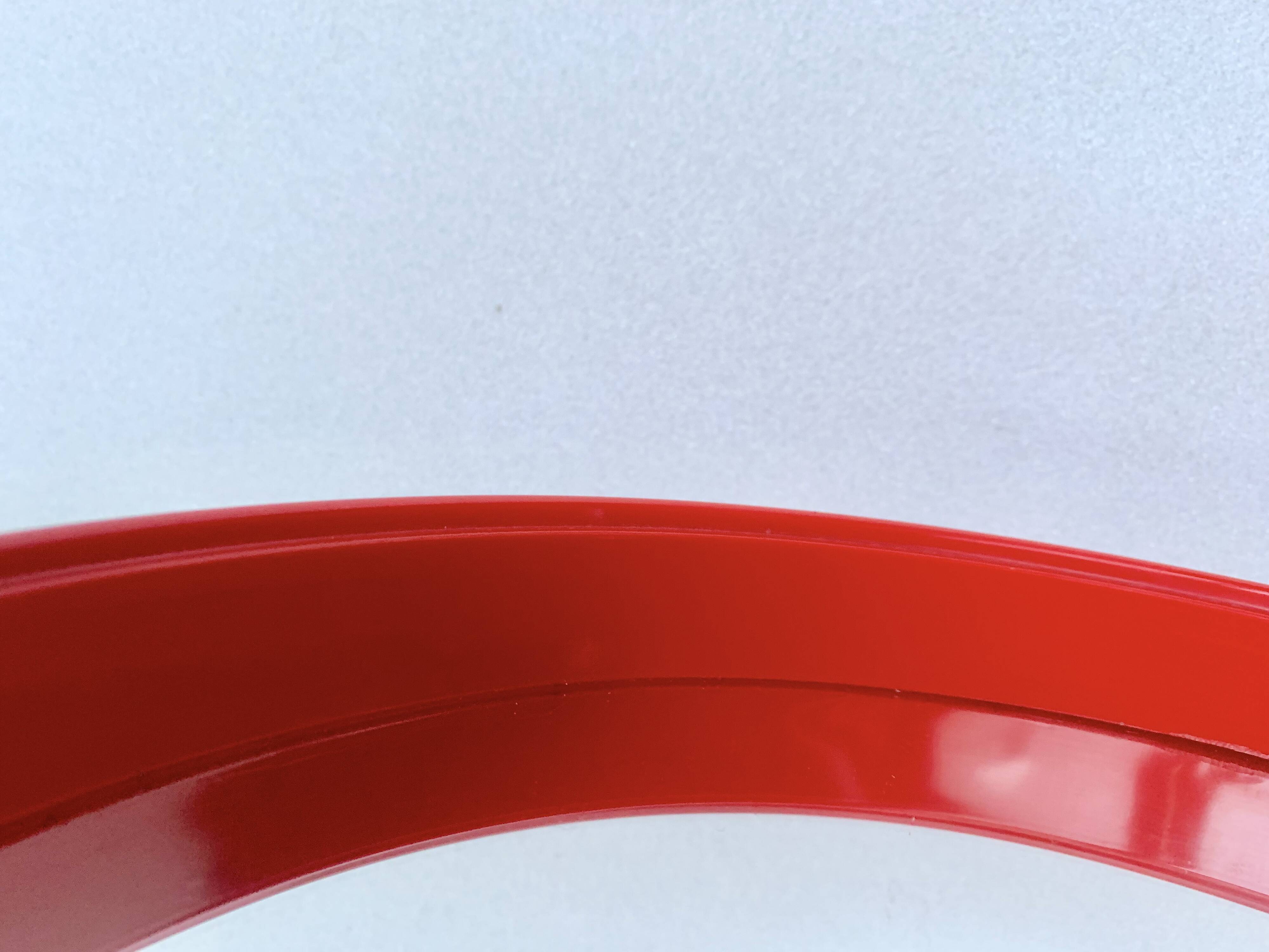 Pair of vintage round red plastic mirrors