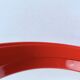Pair of vintage round red plastic mirrors