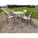 Garden furniture in stone with a vintage 1970s iron base.