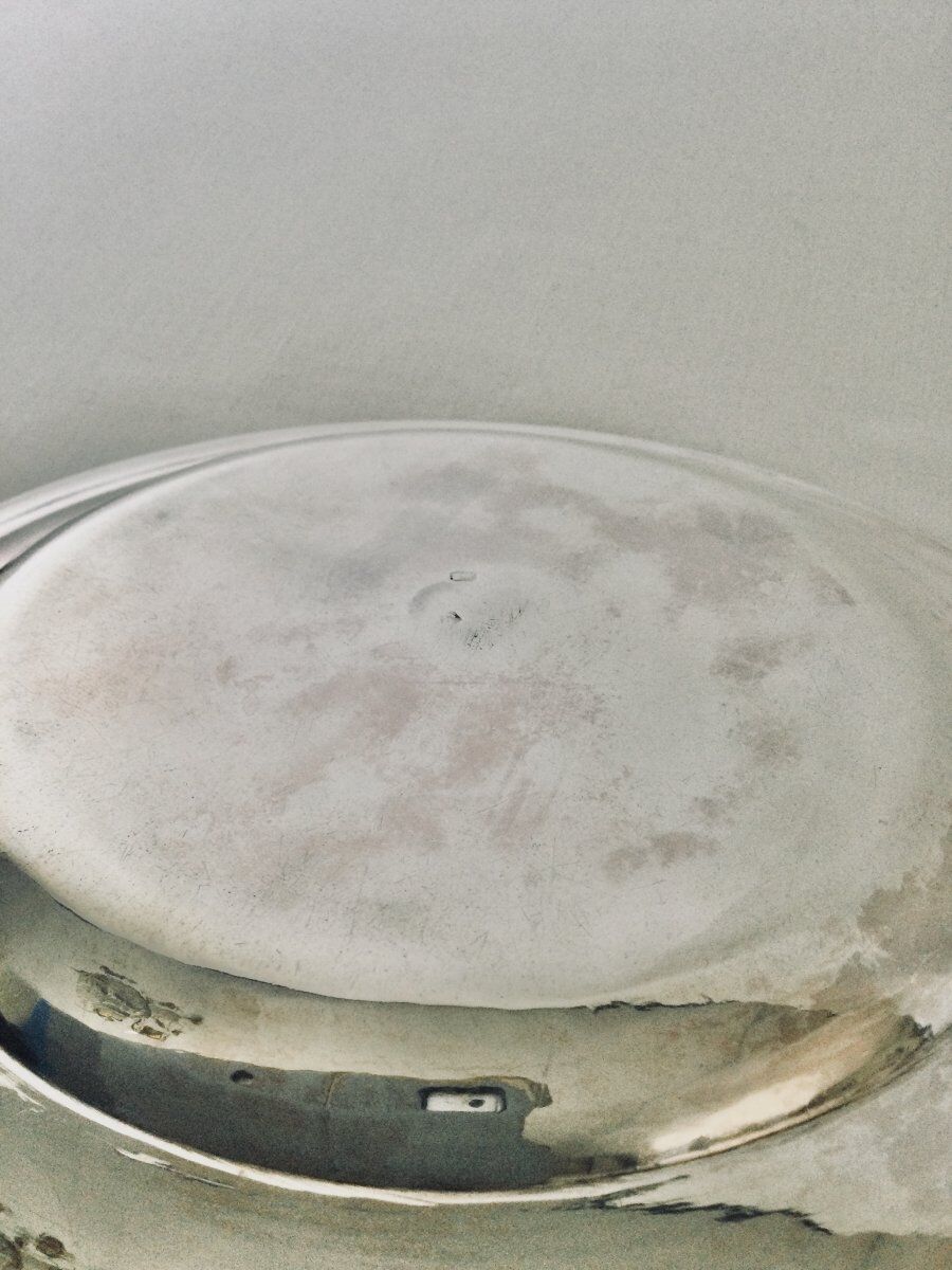 Solid silver dish with old man