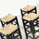 ensemble de quatre tabourets de bar en rotin et bois