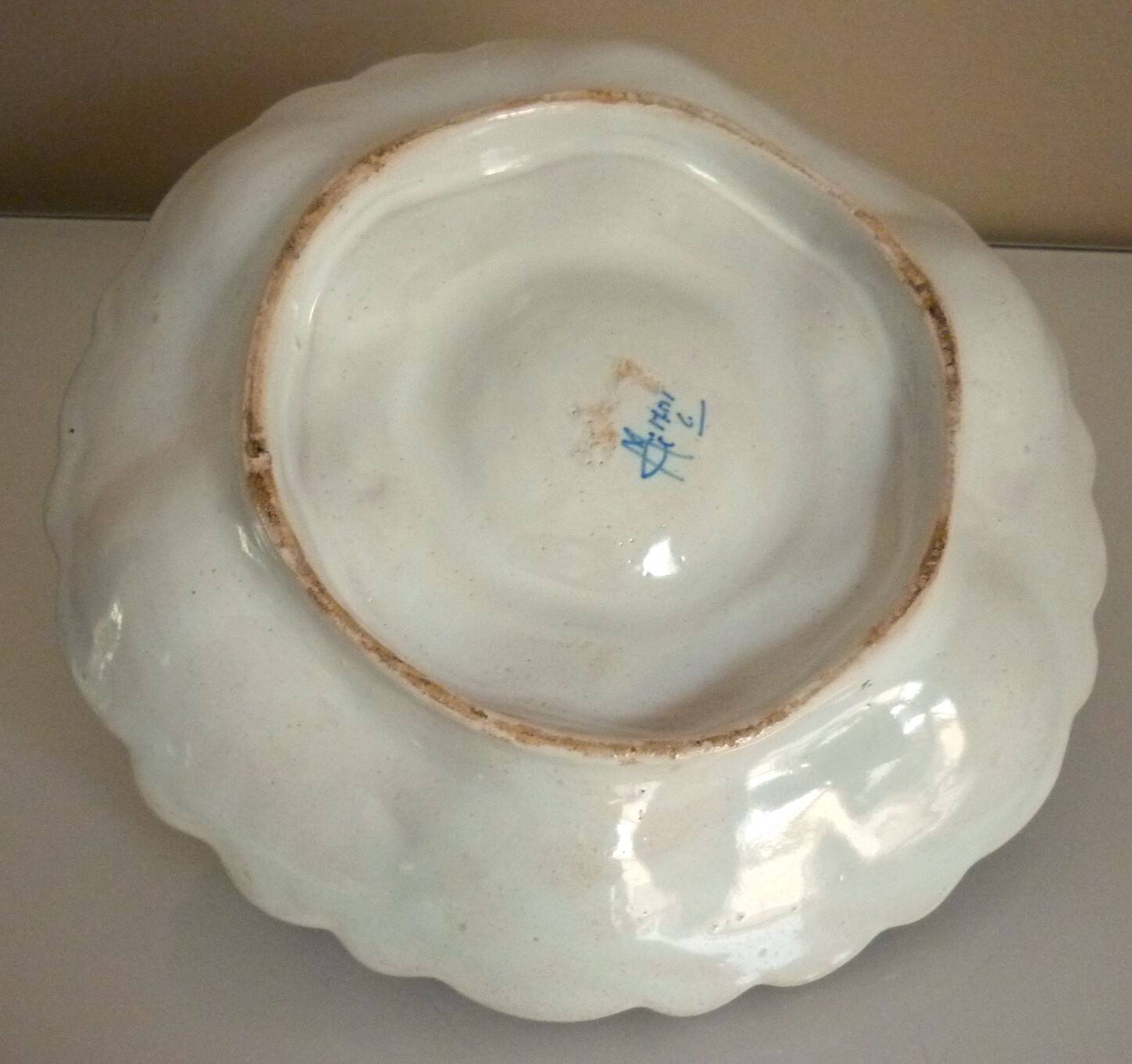 Dish, egg server in hand-painted earthenware, signed Geo Martel