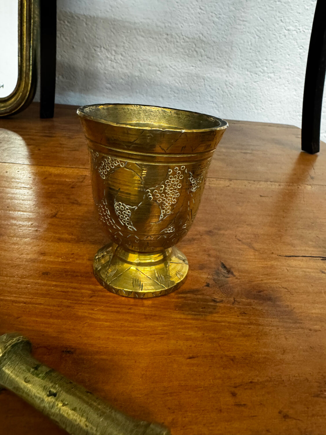 Golden brass mortar and pestle
