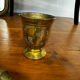 Golden brass mortar and pestle