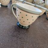 Set of polka dot porcelain cups and plates