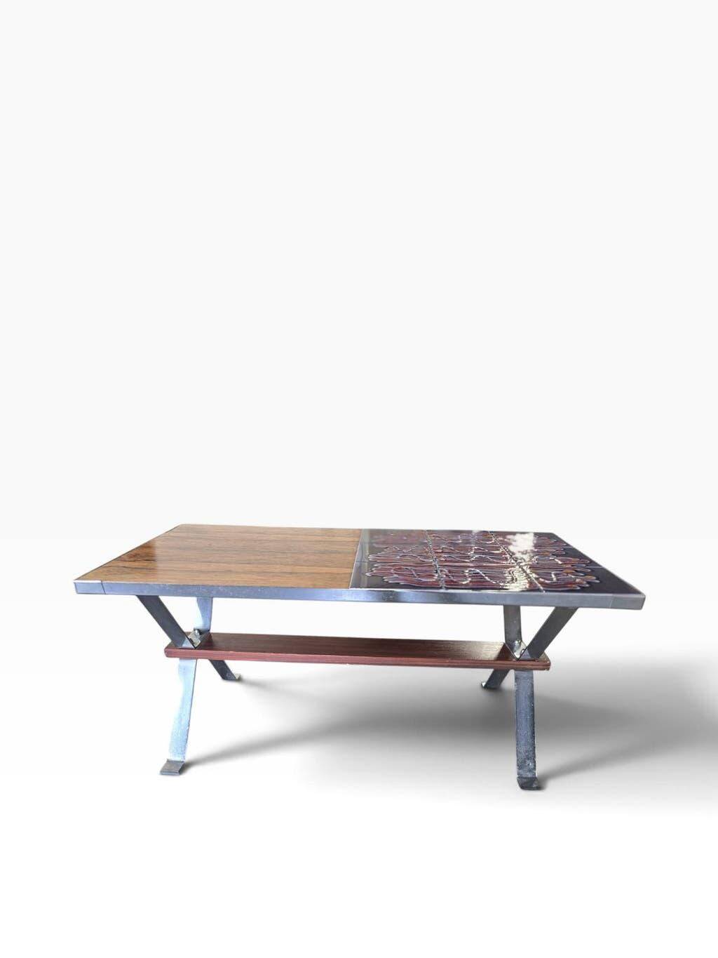 Vintage chrome coffee table with ceramic accent.
