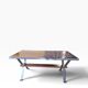 Vintage chrome coffee table with ceramic accent.