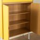 Classic sideboard from the 1960s, oak veneer, yellow Resopal, white steel feet