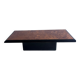 Vintage coffee table in wood burl on a black lacquered base.