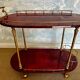 Cherry-red bar cart by Aldo Tura, Italy, 1960s, Hollywood Regency