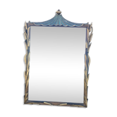 Carved wooden mirror with rushes and a pagoda.