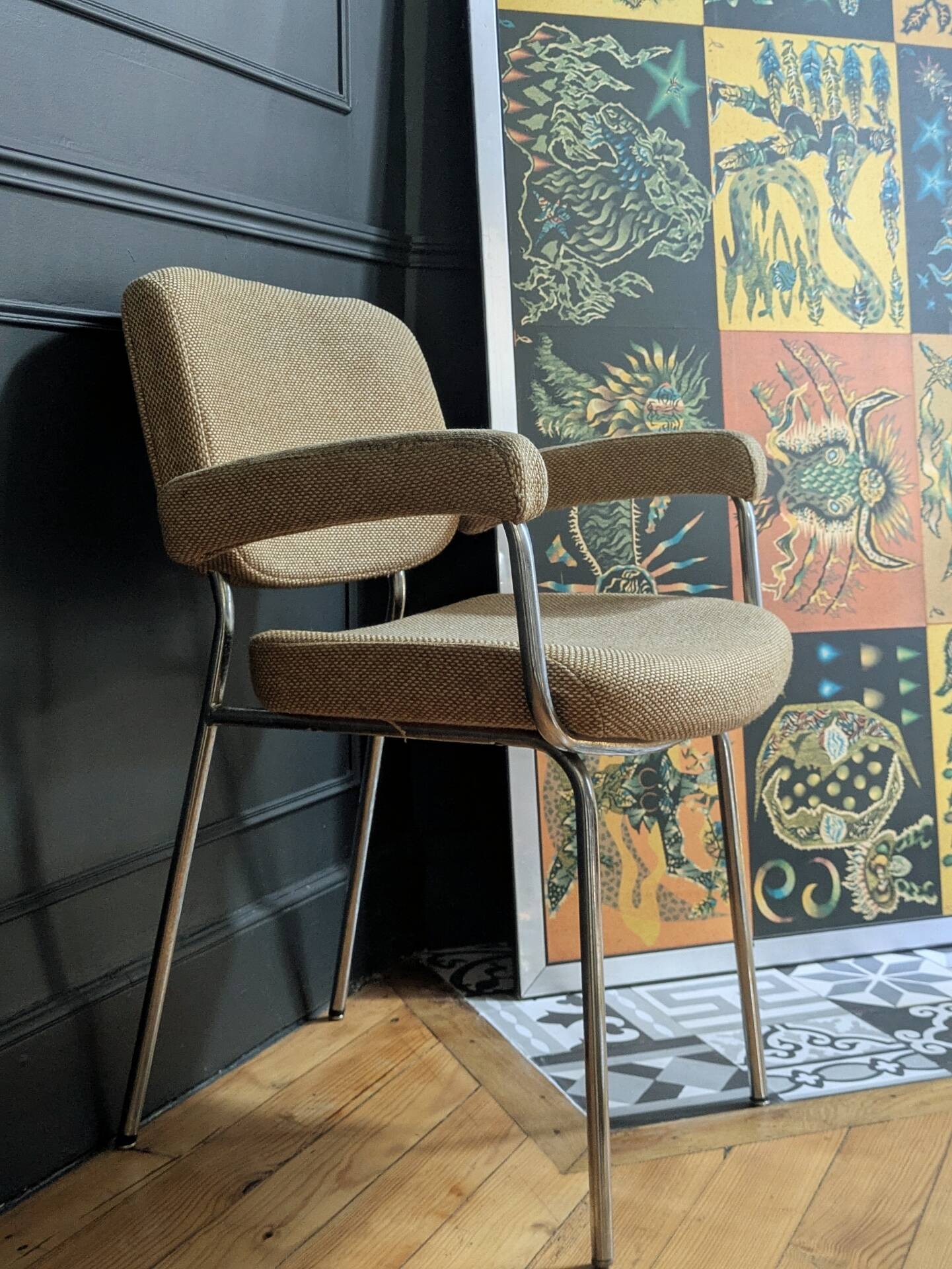 vintage tubular metal chrome office chair with patterned fabric.
