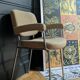 vintage tubular metal chrome office chair with patterned fabric.