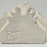 Signed stone owl sculpture