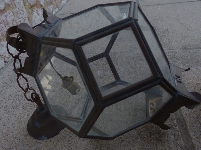 Old lantern in brass and glass with 8 facets or 24 stained glass windows
